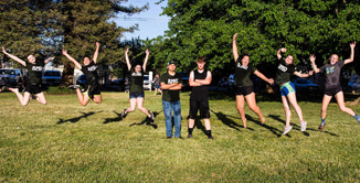 picture of employees jumping for joy