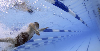 photo of people lap swimming