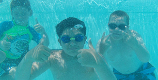 Picture of kids swimming underwater